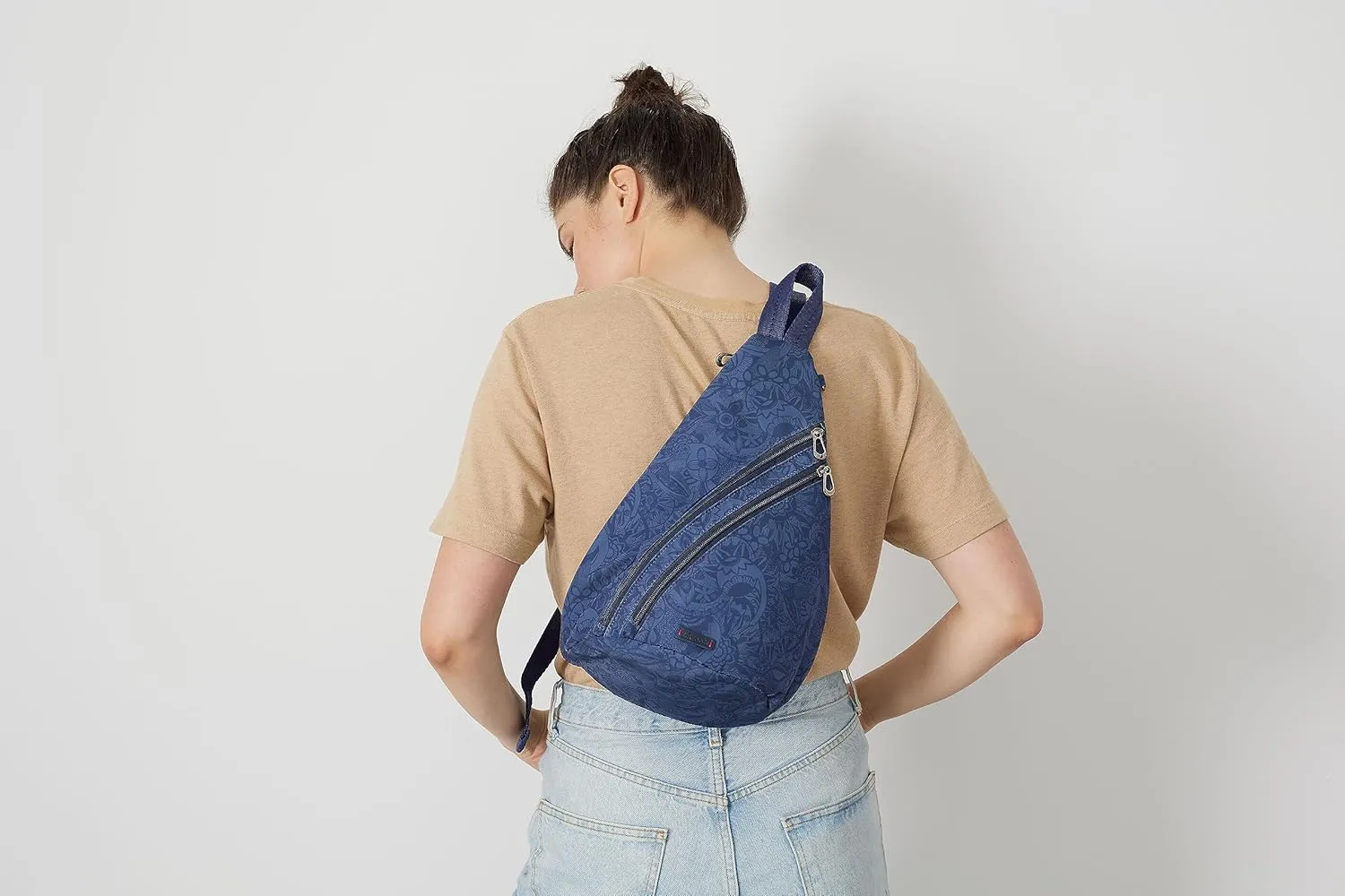 Sakroots On The Go Large Sling Backpack in Eco-Twill, Convertible Crossbody Bag, Indigo Spirit Desert